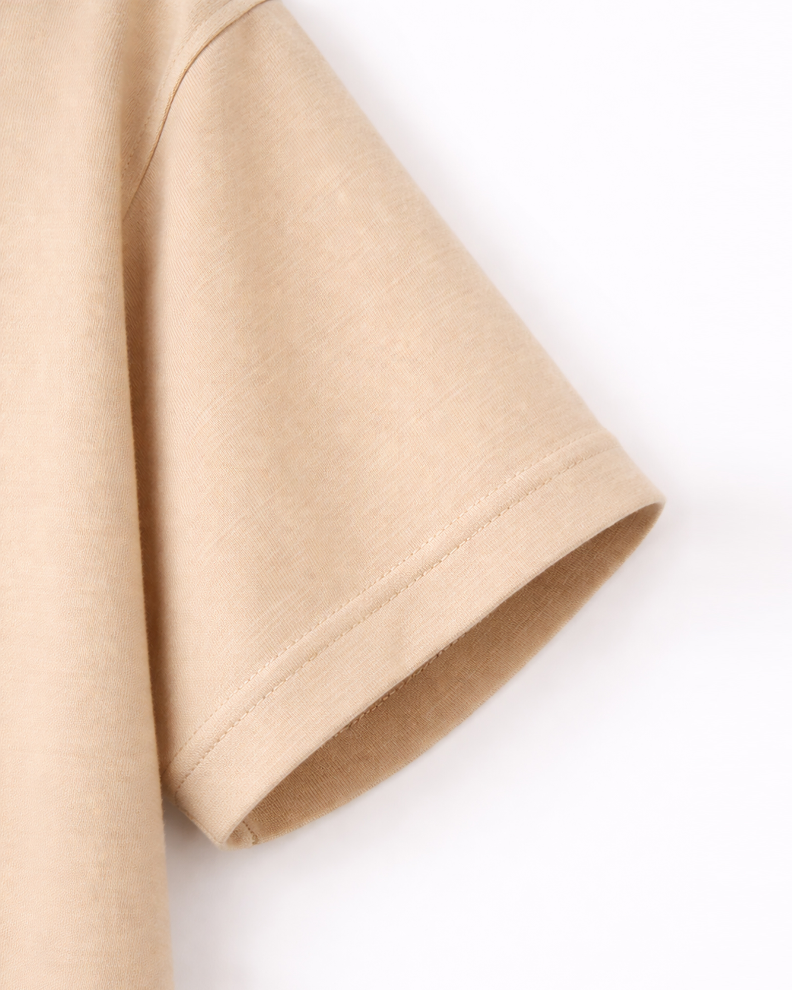 T-Shirts Made in Portugal - Detail vom Ärmel / Farbe Beige T-Shirts Made in Portugal - Detail vom Ärmel / Farbe Beige